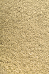 Close up of organic green natural clay powder for face mask, face cream, body wrap, selective focus. Abstract background