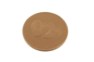 Thin,coin shaped chocolate candy with hearts isolated on white background