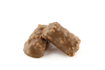 Two chocolate covered crunchy snacks isolated on white background