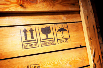 Wooden box with stamp is treated carefully