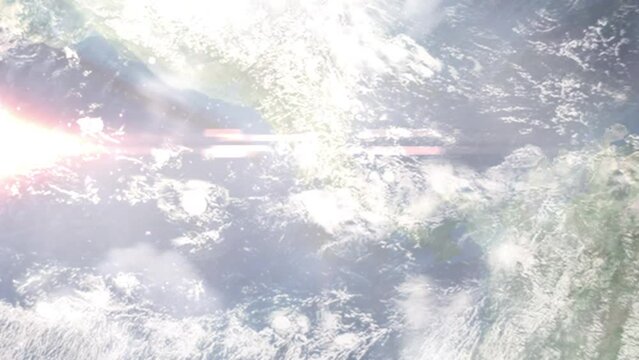 Earth zoom in from outer space to city. Zooming on Puntarenas, Costa Rica. The animation continues by zoom out through clouds and atmosphere into space. Images from NASA