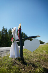 Sign showing the way to the bride and groom's party