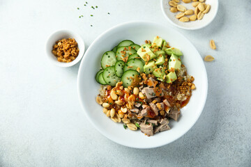 Rice bowl with duck and avocado