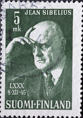 Finland - circa 1945: a postage stamp from Finland, showing a portrait of the composer Jean Sibelius, 80th Birthday