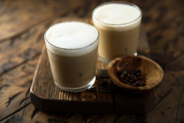 Iced coffee drink with milk foam
