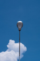 street lamp on cloud and blue sky background