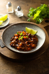 Homemade red bean ragout with vegetables and lime