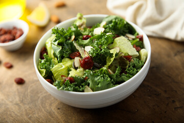 Healthy kale salad with cranberry and almond