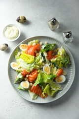 Homemade Caesar salad with salmon