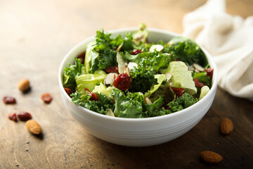 Healthy kale salad with cranberry and almond