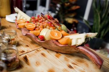 Decorated catering banquet table with different food appetizers assortment on a party