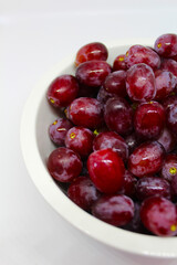 Les raisins rouges en collation