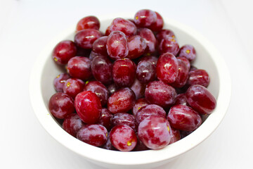 Les raisins rouges en collation