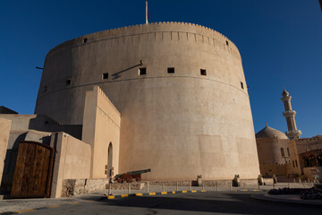 Fototapeta premium A view of the historic Nizwa Fort with the mosque 