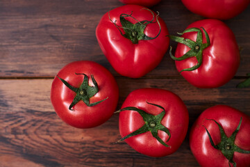 fresh organic tomatoes on table