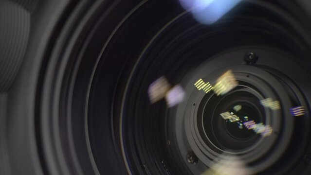 Closeup of professional 4K television zoom lens in news studio