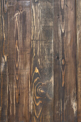 Background with dark wood texture, boards arranged vertically, for text