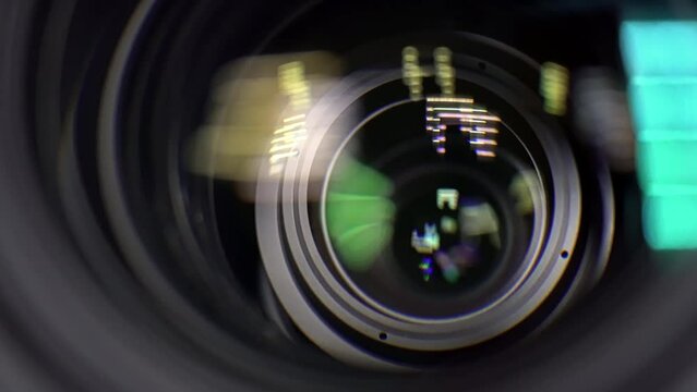 Closeup of professional 4K television zoom lens in news studio