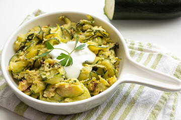 Zucchini baked with egg, semolina and cream