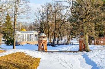 View of the Turkish (Red) Cascade and the Marble Bridge in the Catherine Park in early spring, Pushkin (Tsarskoye Selo), St. Petersburg, Russia