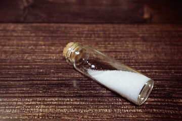 Food additive E330. Citric acid in a small flask