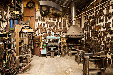 Fototapeta na wymiar Organization and beauty in one space. Shot of the interior of a metal shop.