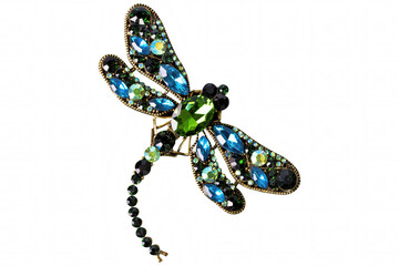 A red and blue dragonfly jewelry on white background, isolated.