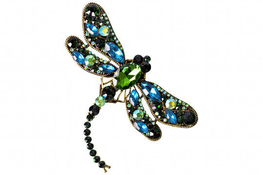 A red and blue dragonfly jewelry on white background, isolated.