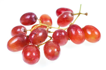 Red grapes on a white background.