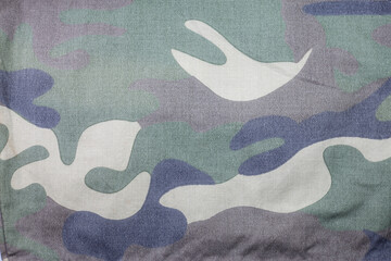 Military green camouflage background. © peterkai