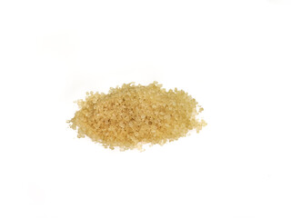 Heap of granulated brown sugar on a white background, macro photo, lots of detail