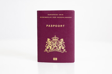 Dutch passport from the Netherlands isolated on a plain white background 