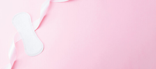 Feminine hygiene menstrual pads. Menstruation napkin for woman hygiene on pink background. Menstruation feminine period. Menstruation, critical days, zero waste, eco, ecology banner.