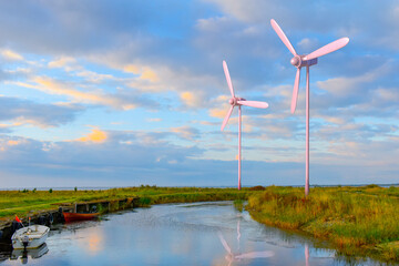 Wind turbines, green renewable energy, river, sea, water - 496483622