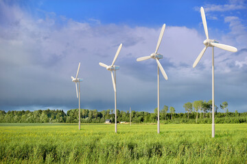 Wind turbines, green renewable energy - 496483623