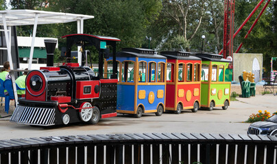 A train with trailers for children, on the playground