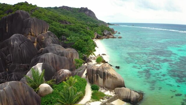 Flying above Anse Source D'argent beach at the La Digue Island, Seychelles