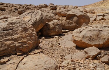 Unreally spherical rocks concretions in Nahal Keidar reserve, South Israel, sunset time, twilight