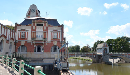 Historic building of hydroelectric power station called Hucak in Hradec Kralove, Czech Republic in the middle of summer