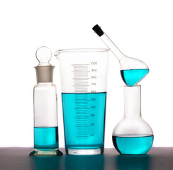 Chemical Flasks with blue liquid isolated on white background