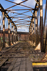 Old ruined bridge across Radunia river