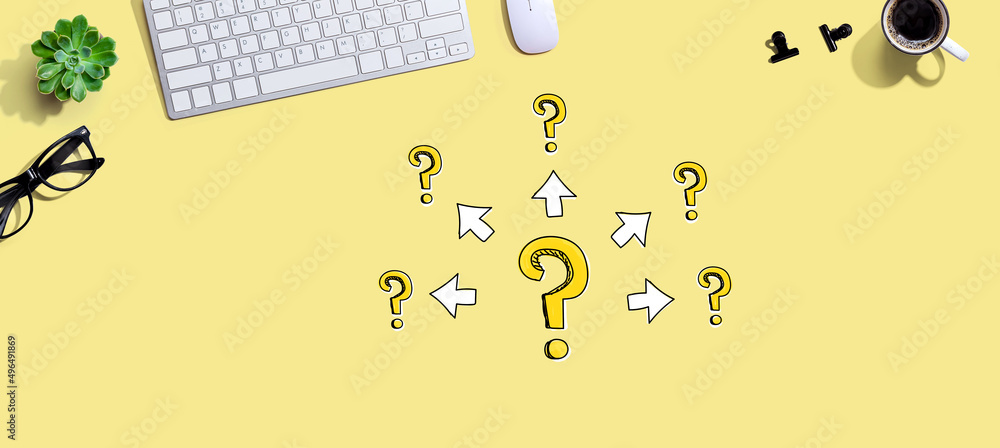 Poster big and small question marks with arrows with a computer keyboard and a mouse