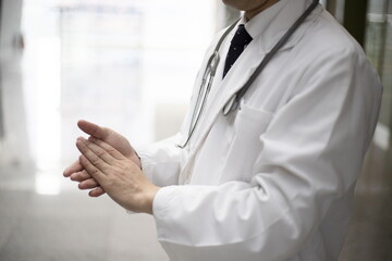 Close up of doctor applauding at hospital
