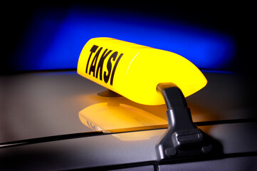 Taxi light bulb on a car ceiling