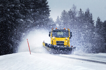 Snow plows plow roads in Finland - obrazy, fototapety, plakaty