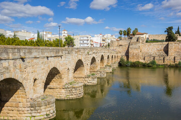 Historic roman bridge (Puente Romana) over the Guadiana river in Merida, Spain