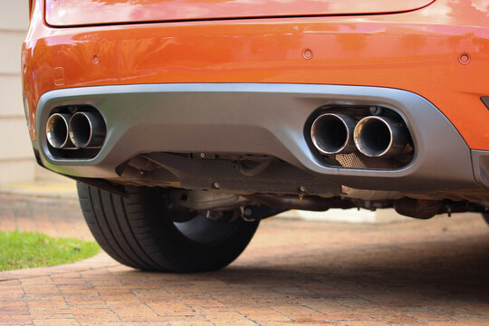 Four exhaust pipes of a high performance vehicle