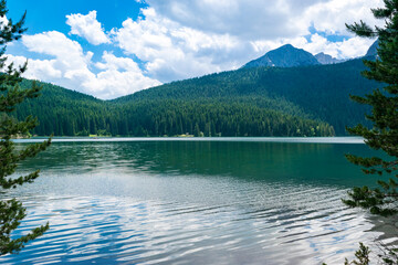 Glacial Black Lake with Meded Peak. Premium tourist attraction of Durmitor National Park.  Montenegro.