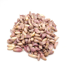 Garlic cloves stack on white background.