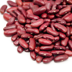 Heap of red bean on white background. spot focus